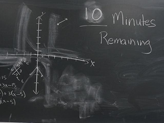 blackboard showing minutes remaining in an exam